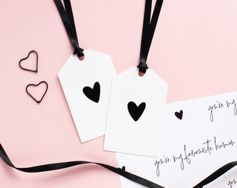 Black heart gift tag with ribbon