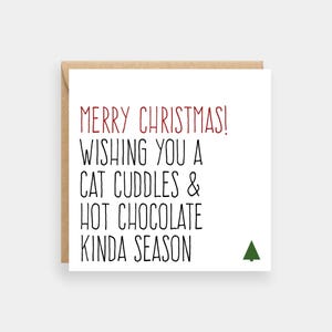 Câlins de chat et cartes de Noël de chat au chocolat chaud