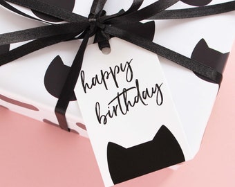 Black cat happy birthday gift tag with ribbon