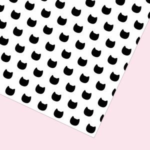 以下が含まれることがあります： 白い背景に、黒い猫のシルエットが繰り返しパターンで描かれている。