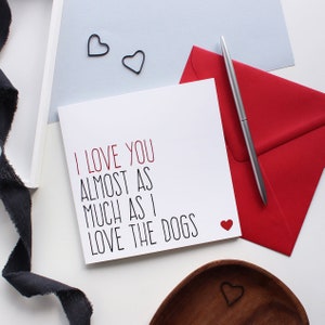I love you almost as much as I love the dogs Valentines card with red envelope.