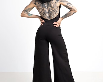 Backless hooded wide leg jumpsuit. Cowl neck open back palazzo jumpsuit