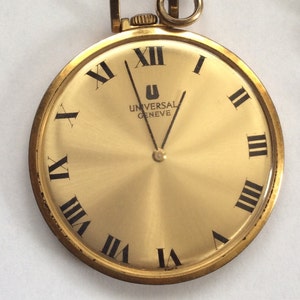 Vintage Universal Geneve pocket watch open face gold filled case 41 mm. in diameter