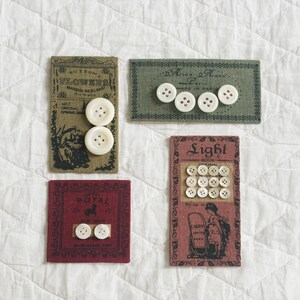 Carte à boutons anciens, en nacre ou en corozo