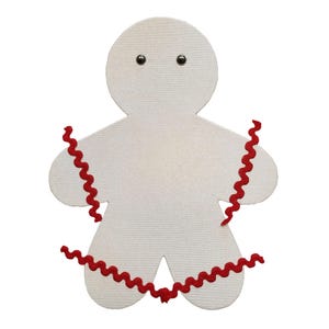 May include: A white gingerbread man cutout with red curly trim around the edges and two black eyes.