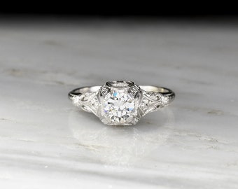 Edwardian Engagement Ring: c. 1910s Antique Diamond and Platinum Engagement Ring with Ornate Metalwork