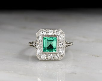 Antique Edwardian/early-Art Deco GIA Colombian Emerald, Diamond, and Platinum Engagement Ring with Tulip Shoulders