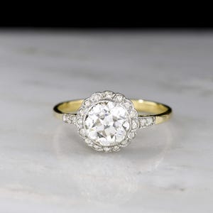 Gilded Age Two-Toned Cluster Ring with a Floral-Patterned Transitional Cut Diamond Center image 1