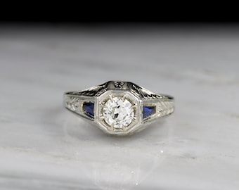 Antique / Vintage / Estate Engagement Ring: c. 1920s Art Deco Diamond and Sapphire Ring with Engraved Foliate Patterns