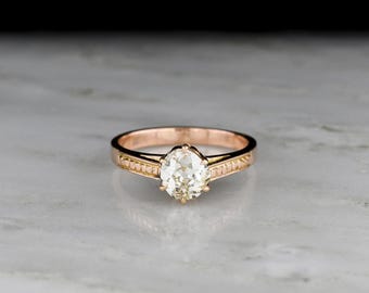 Vintage, dödsbo ca tidigt 1900-tal Post-viktoriansk katedralmonterad solitaire förlovningsring med en gammal gruvslipad diamant, antikt 18K roséguld
