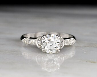 Vintage Engagement Ring: c. 1930s - 1950s Art Deco / Midcentury Platinum and Round Brilliant Cut Diamond Engagement Ring