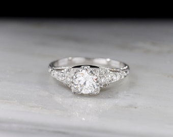 Vintage Engagement Ring: 1920s - Early 1930s Art Deco Signed Katz & Ogush Platinum and Transitional Cut Diamond Ring with Engraving