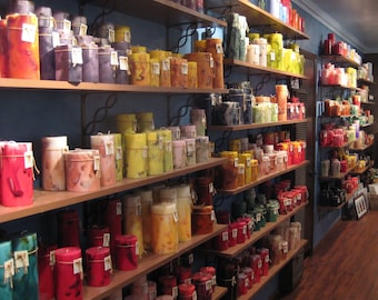 Extremely long burning scented pillar candles. Hand-poured quality, elegant, vibrantly colored.