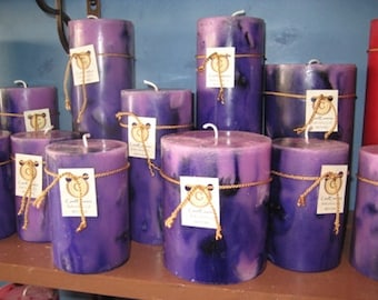 Extremely long burning scented pillar candles. Hand-poured, quality, elegant, vibrantly colored.