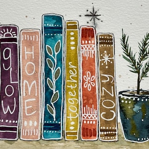 May include: Watercolor painting of a bookshelf with six books. The books are labeled "GLOW", "HOME", "together", "COZY", and two other words that are not visible. A small potted plant is on the right side of the shelf.