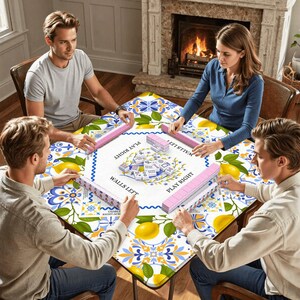 May include: Four people are gathered around a square table playing a game. The table is covered with a white, blue, and yellow patterned cloth. Pink game pieces are arranged around the table. The game appears to be Mahjong. The text "PLAY RIGHT" and "WALLS LEFT" is visible.
