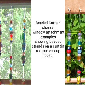 May include: Beaded curtain strands hanging from a window rod and cup hooks. The strands are made of colorful glass beads and feature different patterns and designs.