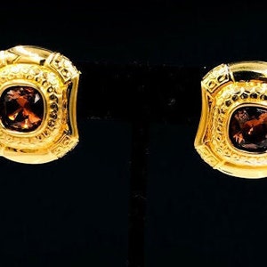 RARE Vintage Swarovski Facted Brown TOPAZ Bezel Set in gold tone post earrings . Has Swan Logo . Measures 1 1/4 inch L   1 7/8 inch  W .