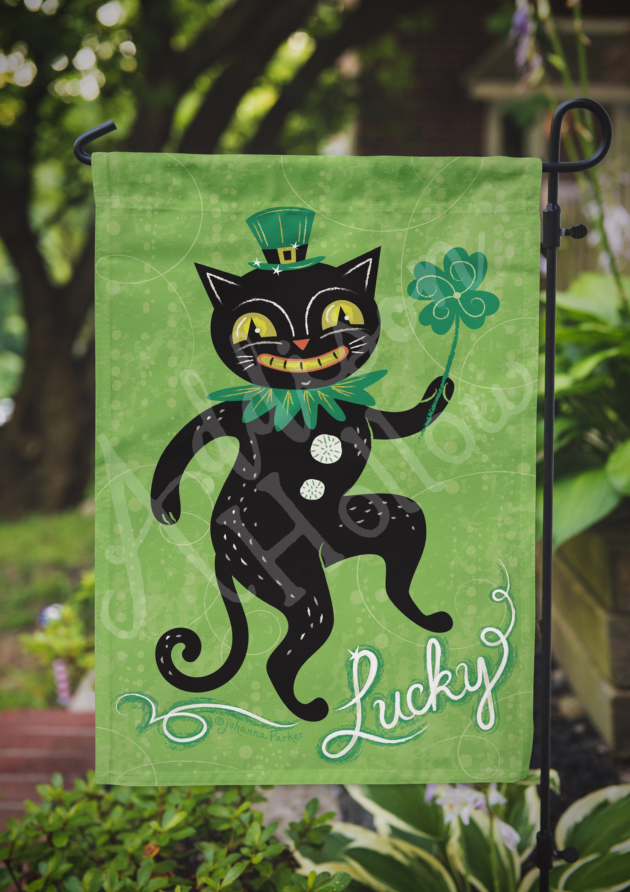 Small garden flag with Happy St. Patrick's Day message and green and white design