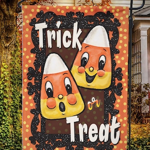 May include: Halloween garden flag featuring two cartoon candy corn characters with smiling faces, set against an orange polka-dot background. The words "Trick or Treat" are displayed in white text within a black ornate frame.