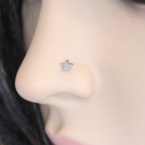 Tiny black rhodium star nose stud, also avialable in tragus or cartilage earring, tiny tragus earring, cartilage stud earring, nose ring.