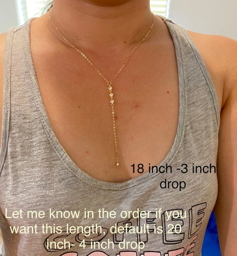 May include: A gold chain necklace with small clear stones. The necklace is 18 inches long with a 3 inch drop. The text "Let me know in the order if you want this length, default is 20 inch - 4 inch drop" is visible in the image.