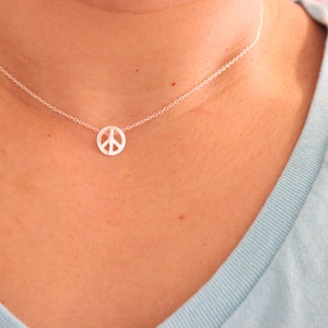 Sterling silver peace necklace, tiny peace charm,  dainty delicate silver necklace, tiny necklace, minimalist, everyday jewelry, sister gift