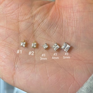 May include: A collection of square-cut, clear gemstone earrings in various sizes. The earrings are set in gold and silver tones, with sizes ranging from 3mm to 5mm. The image includes labels #1, #2, and #3 to indicate different styles.