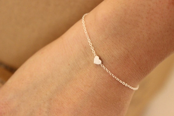 Silver bracelet with rose gold heart discount