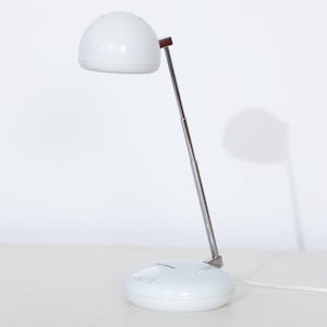 May include: A set of three ceramic mugs with a speckled, matte finish. The mugs are in shades of cream, light gray, and dark gray. Each mug has a simple, minimalist design, perfect for coffee or tea.