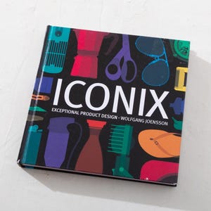 May include: A hardcover book titled "ICONIX" with a black cover featuring colorful illustrations of various objects. The book's subtitle reads "Exceptional Product Design" by Wolfgang Joensson.