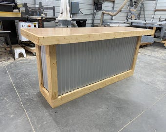 The Straight Oak Smooth Top corrugated metal and wood indoor bar, or retail sales counter