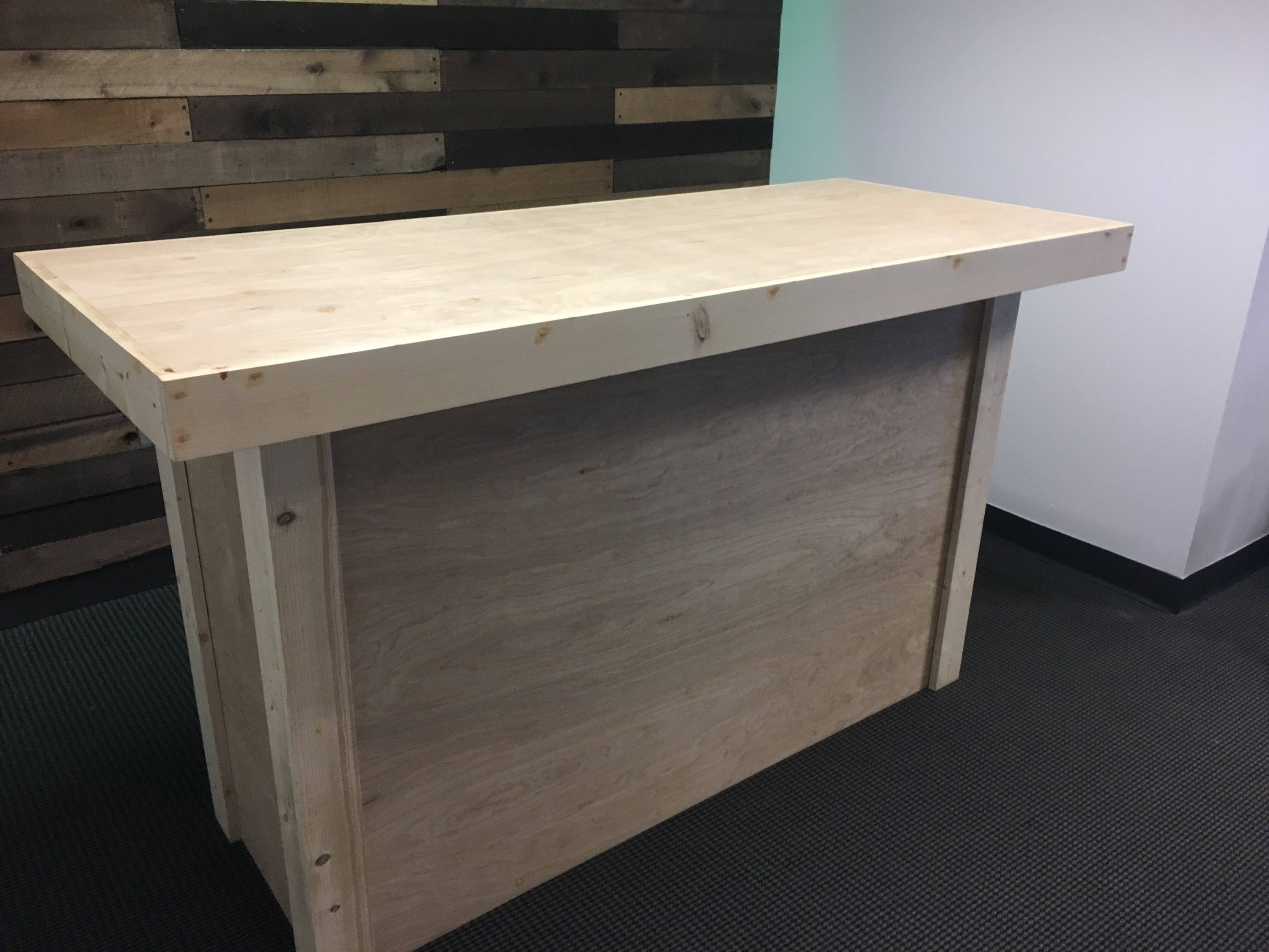The Reality Unfinished Birch Top And Front Sales Counter
