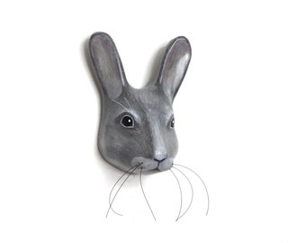 Paper mache grey rabbit with the structure, eye catcher