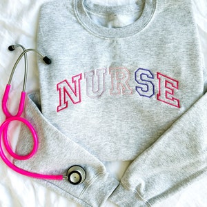 Pink-Purple Embroidered NURSE Athletic Block Gemma Sweatshirt | Nurse Pullover Sweatshirt | Gift for Grad | New Nurse Gift | Nurse T-Shirt