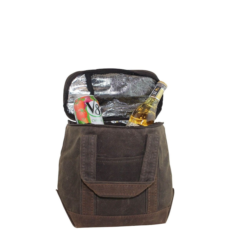 May include: A brown canvas tote bag with a zippered insulated cooler compartment. The cooler is open and contains a can of V8 juice and a glass bottle of beer.