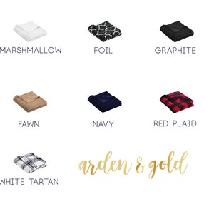 May include: A selection of throw blankets in various colors and patterns, including marshmallow, foil, graphite, fawn, navy, red plaid, and white tartan. The text "arden & gold" is written in gold script.