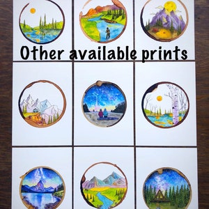 May include: Nine watercolor paintings of different landscapes, each framed in a brown coffee ring. The paintings depict scenes of mountains, forests, rivers, and starry skies. The text "Other available prints" is written in black at the top of the image.