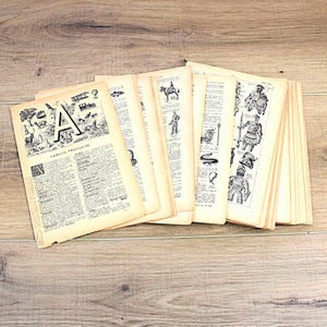 May include: A collection of aged French language book pages. The pages are yellowed, showing signs of wear, and contain illustrations and text. The first page shows a large letter "A" with drawings and the text "LANGUE FRANCAISE".