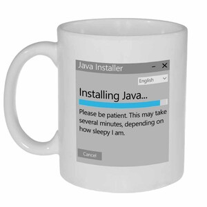 May include: White ceramic coffee mug with a graphic of a Java installer window. The window says "Installing Java..." and "Please be patient. This may take several minutes, depending on how sleepy I am." There is a "Cancel" button at the bottom of the window.