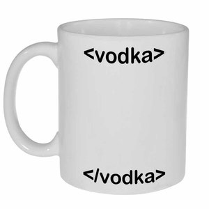 May include: White ceramic coffee mug with black text that reads "<vodka>" and "</vodka>"