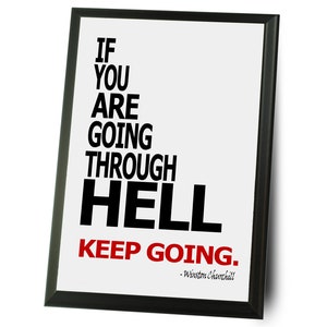 May include: Black and white framed print with the quote "If you are going through HELL keep going. - Winston Churchill" in bold black text. The word "HELL" is in extra large font. The quote "keep going" is in red text.