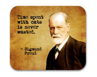 May include: A vintage-style image with a quote by Sigmund Freud: "Time spent with cats is never wasted."