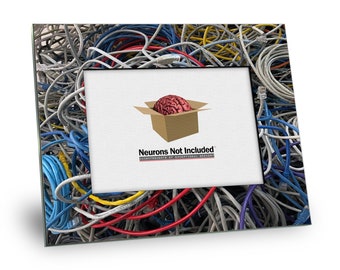 May include: A picture frame with a tangled mess of colorful cables and wires. The frame has a white mat with a logo that says "Neurons Not Included" and a picture of a brain in a box.