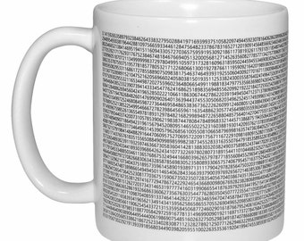 May include: White ceramic mug with a black print of the first 100 digits of pi. The mug has a handle on the right side.