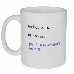 May include: White ceramic mug with black text that reads "#include <stdio.h> int main(void) { printf("Hello World
"); return 0; }"