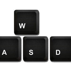 May include: Four black computer keys with white lettering. The keys spell out "WASD", a common gaming key combination.