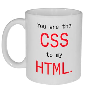 May include: White ceramic mug with the text "You are the CSS to my HTML." in black and red.
