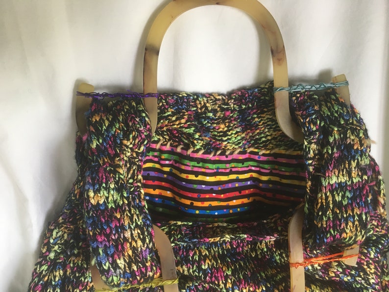 Triangle multi bag with tortoise-colored shell handles