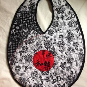 Oval egg shaped purse black and white and red unusual